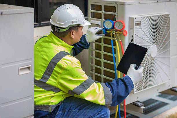 Professional Air Duct Cleaning technician working in Portland, OR